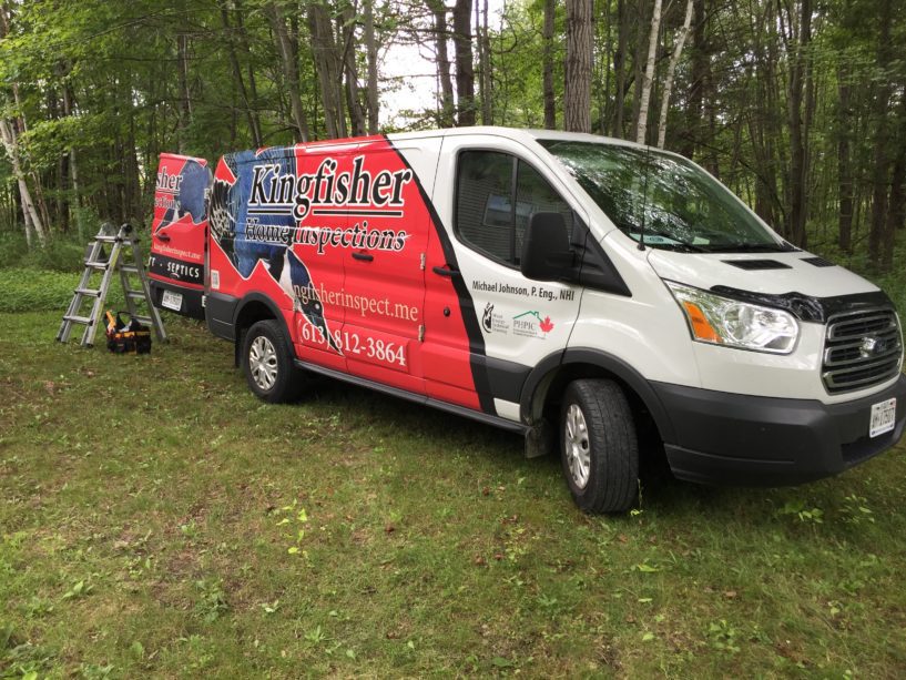 Kingfisher Home Inspections blue, red, and white van with equipment in behind