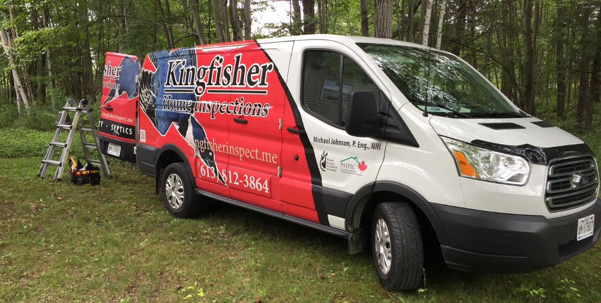 Kingfisher Home Inspections blue, red, and white van with equipment in behind